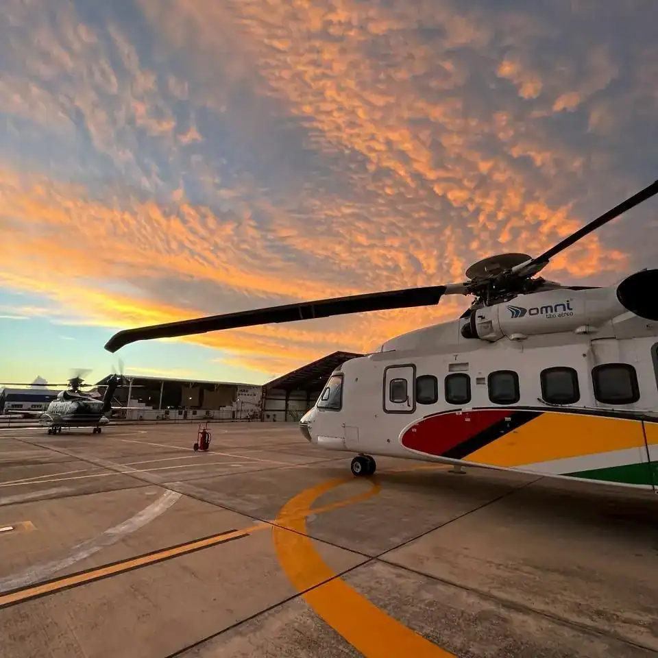 helicopter at sunset
