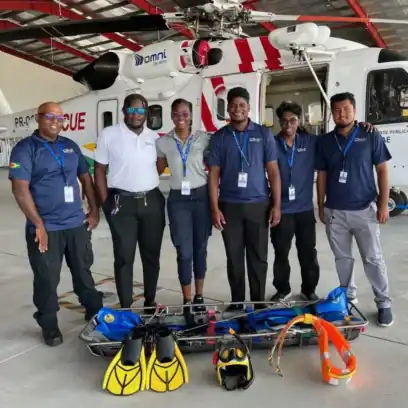helicopter crew in front of helicopter