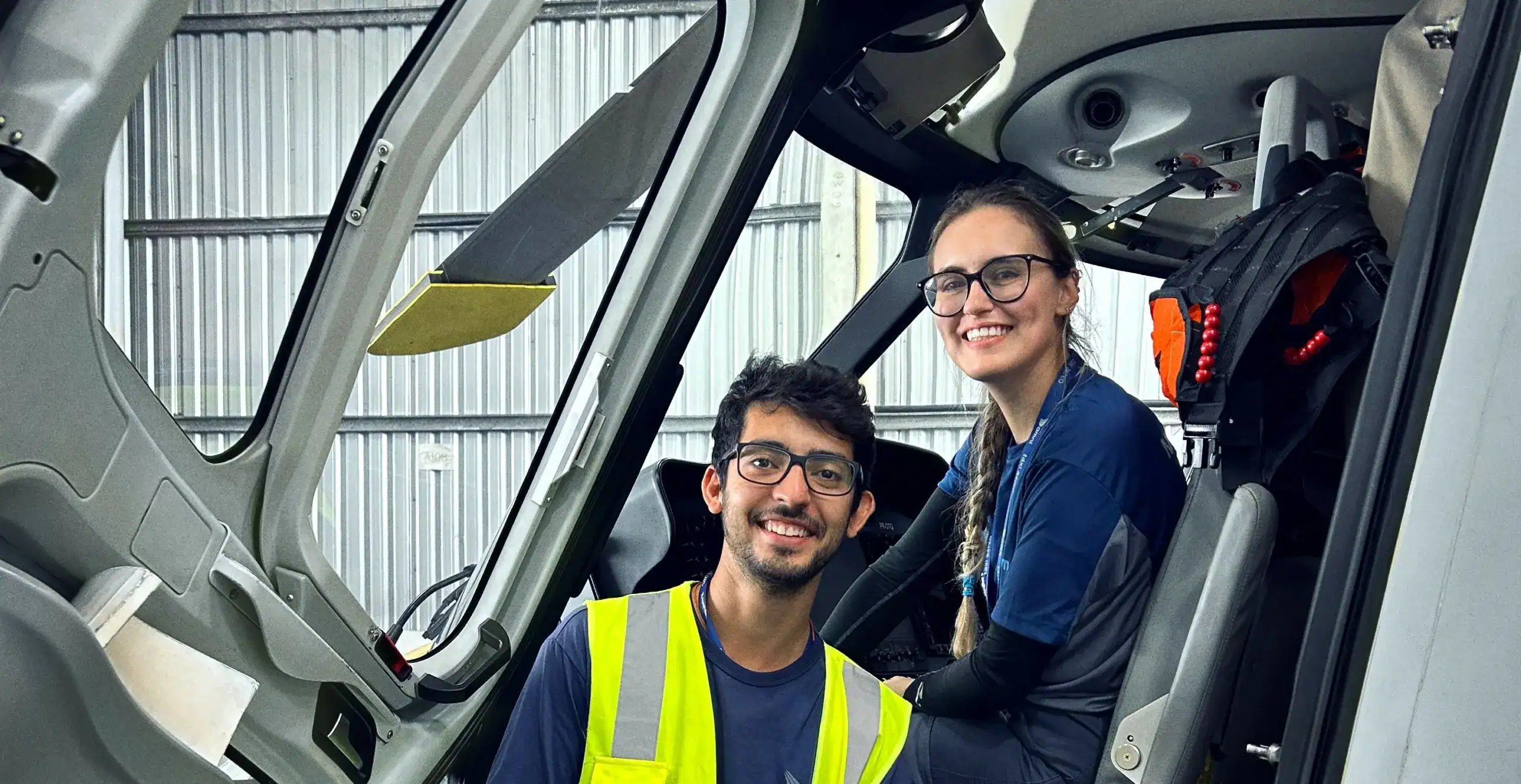 man and woman on Revo helicopter
